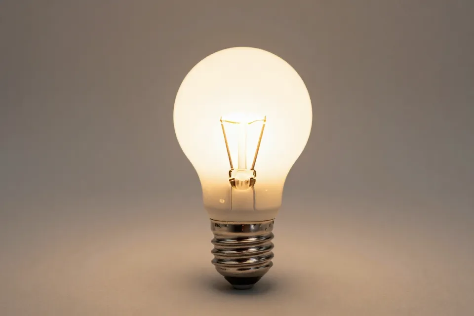 How are watts and kilowatt-hours related?